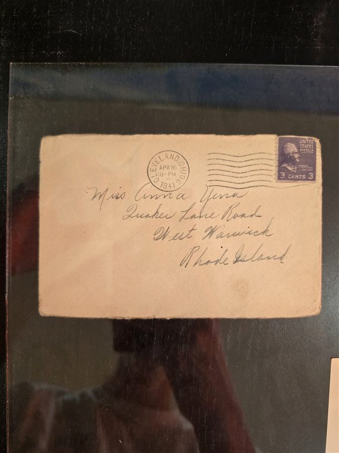 A 1941 envelope addressed to Anna Yena at Quaker Lane, West Warwick — the only pre-war item in the box.