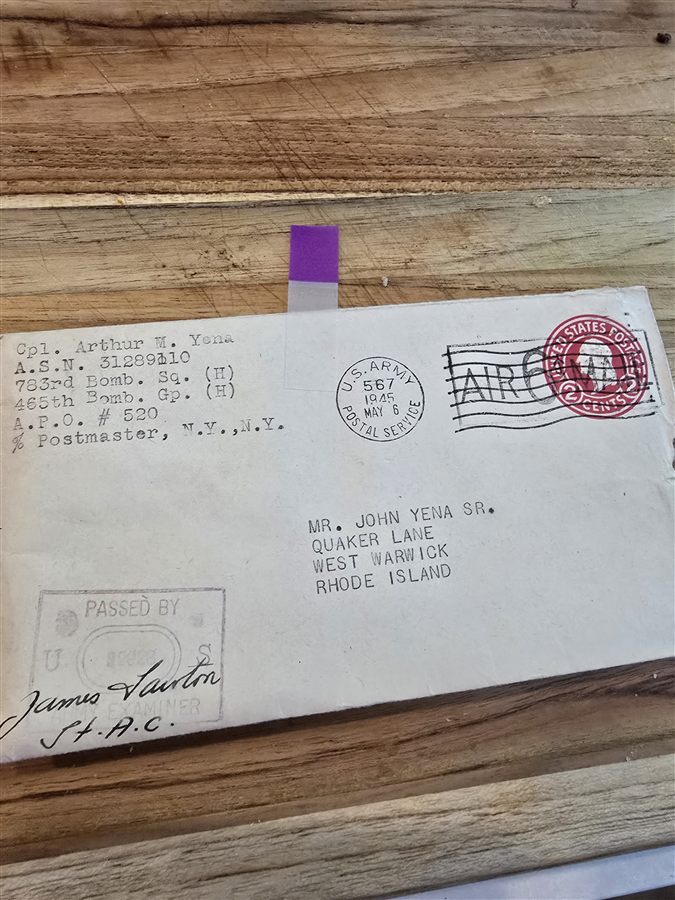 Envelope typed Cpl. Arthur M. Yena, 783rd Bomb. Sq., 465th Bomb. Gp., A.P.O. 520 — U.S. Army Postal Service cancel, May 1945, with the censor's PASSED BY EXAMINER stamp.
