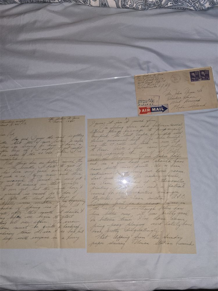 The March 1, 1945 letter and its pages laid out together — the photography letter.